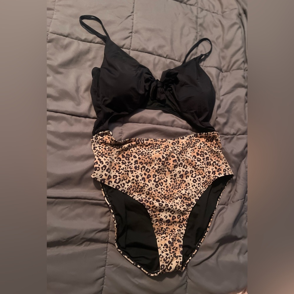 Brand new, never warn one piece cut out swimsuit